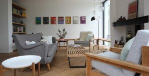 Delightful and warm Scandinavian living room Design by Linea Studio in England