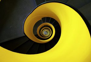 bright yellow spiral staircase