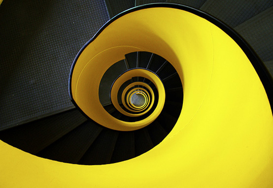 bright yellow spiral staircase