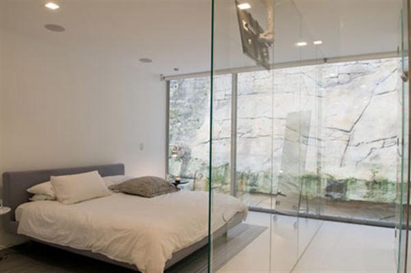 modern and minimalist bedroom Design by Level Orange Architects