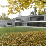 Contemporary Two Story House Design With Rough Stone Facade