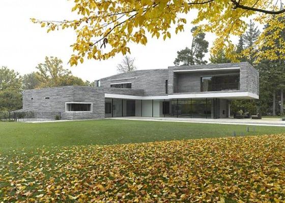 Contemporary Two Story House Design With Rough Stone Facade