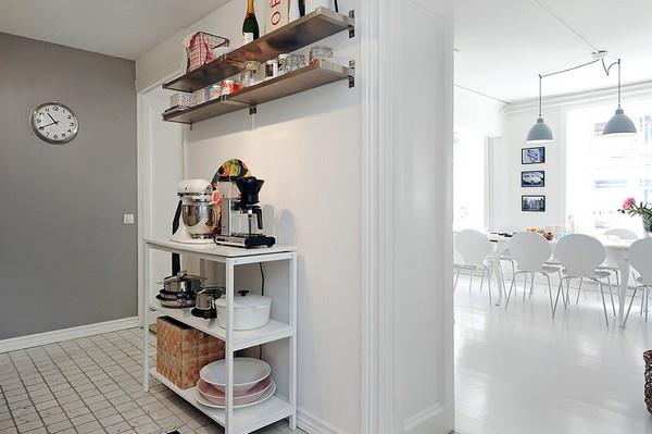 White kitchen decor on stylish duplex apartment by Alvhem