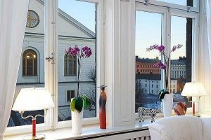 Elegance Apartment Design in Stockholm with wonderful city view from the window