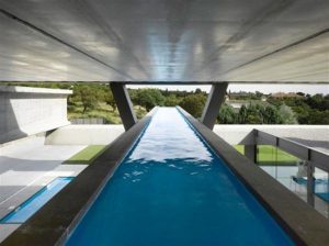 Extraordinary Home by Ensamble Studio with amazing and cool swimming pool